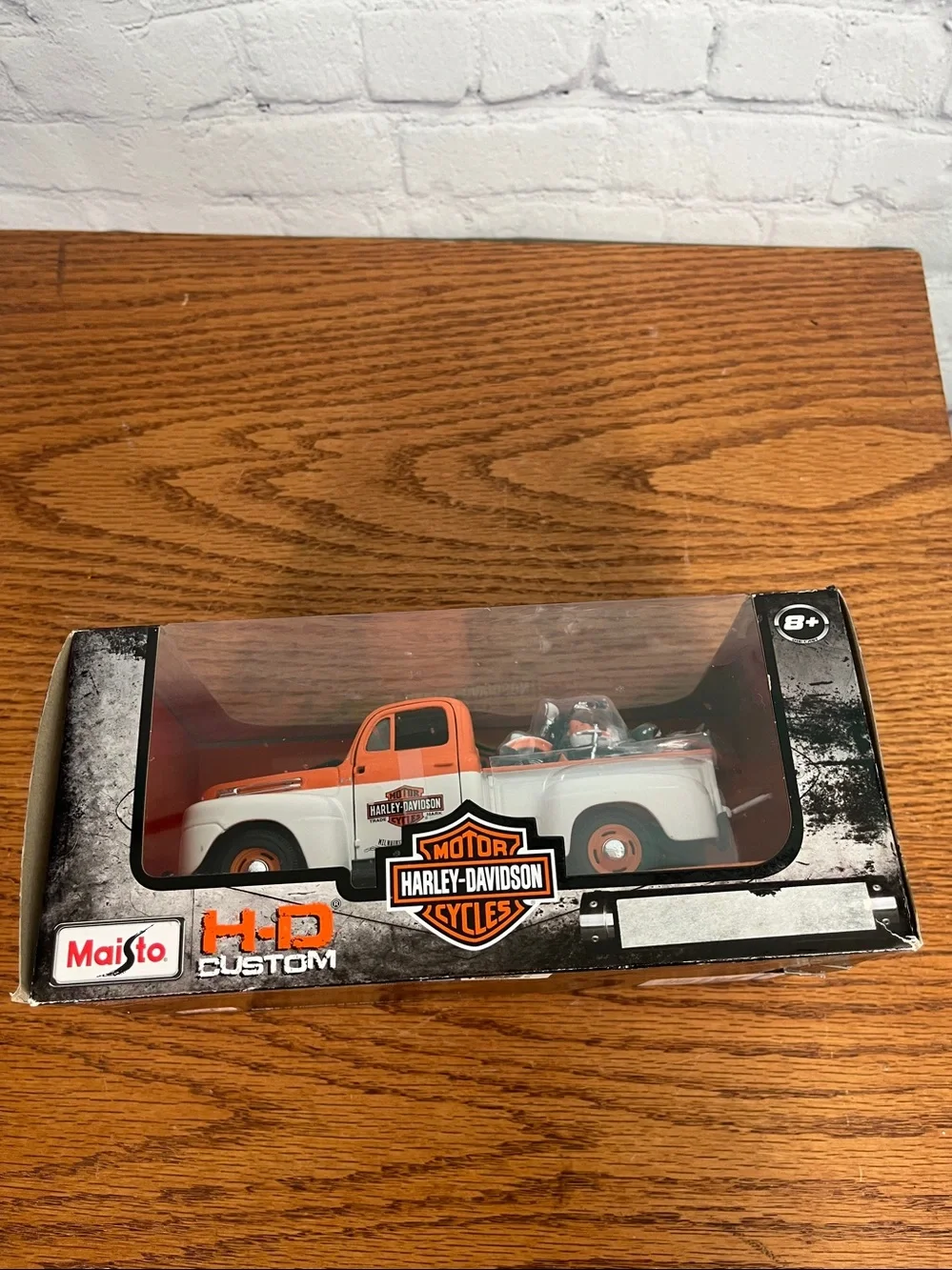 Authentic collectible Harley Davidson 1948 Ford model truck hauling a Panhead